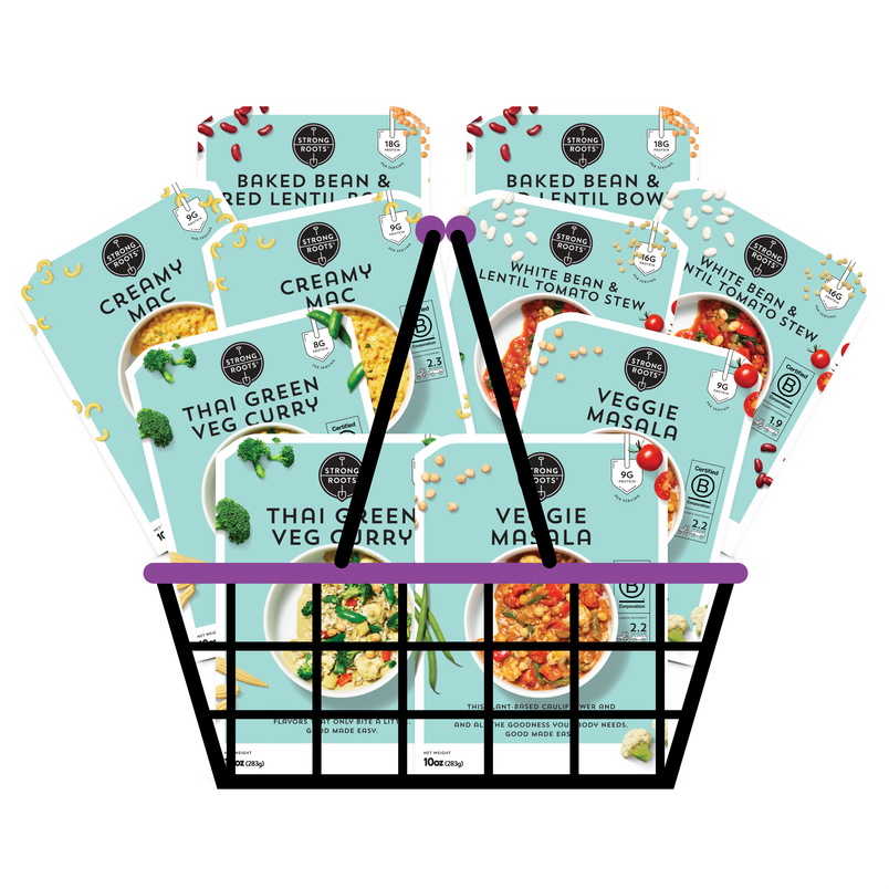 A basket overflowing with 10 Strong Roots Good Made Easy meals, featuring products from the Comfort Food Bundle.